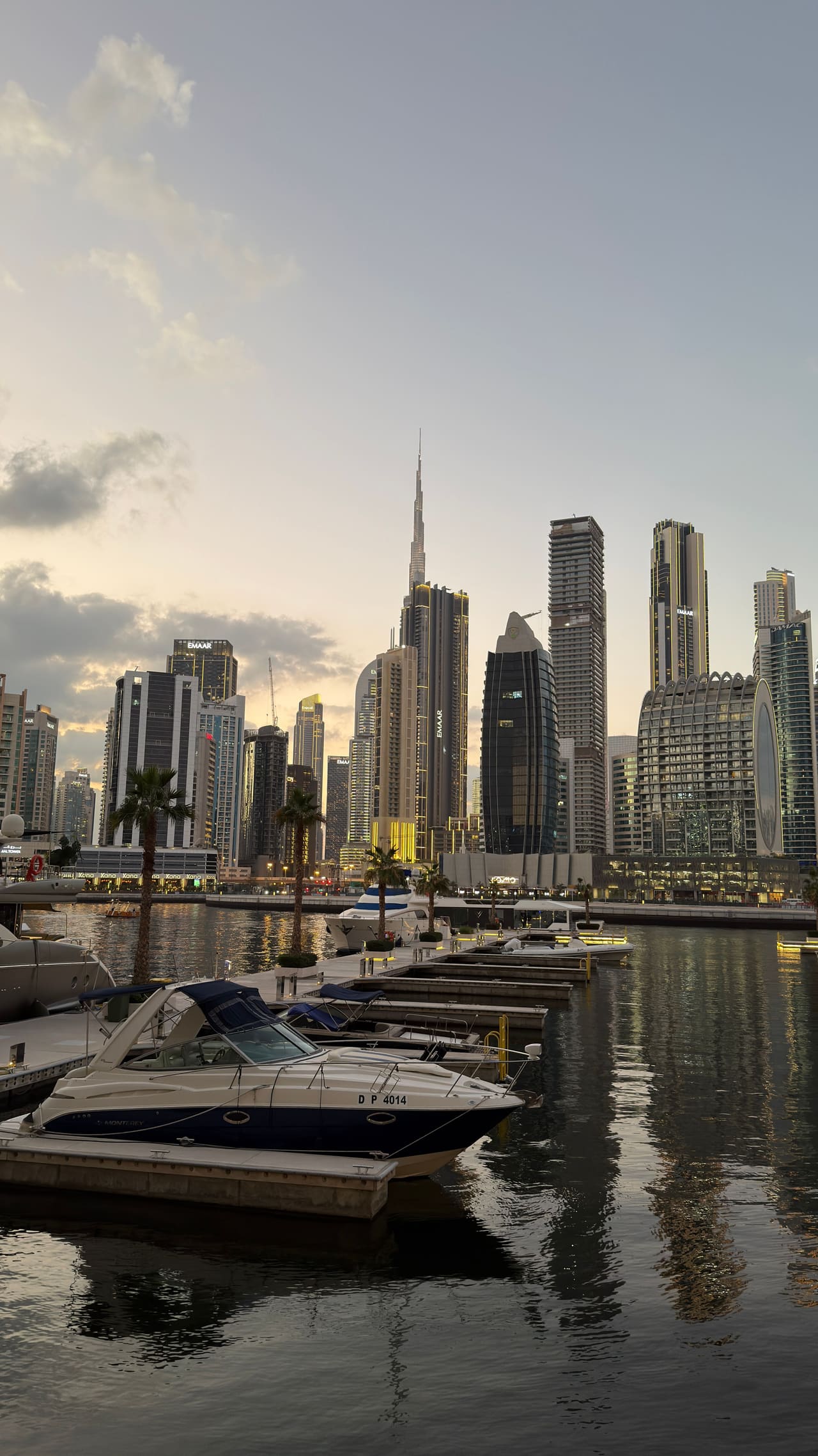 Business Bay towers at dusk, reflected in the water of the canal