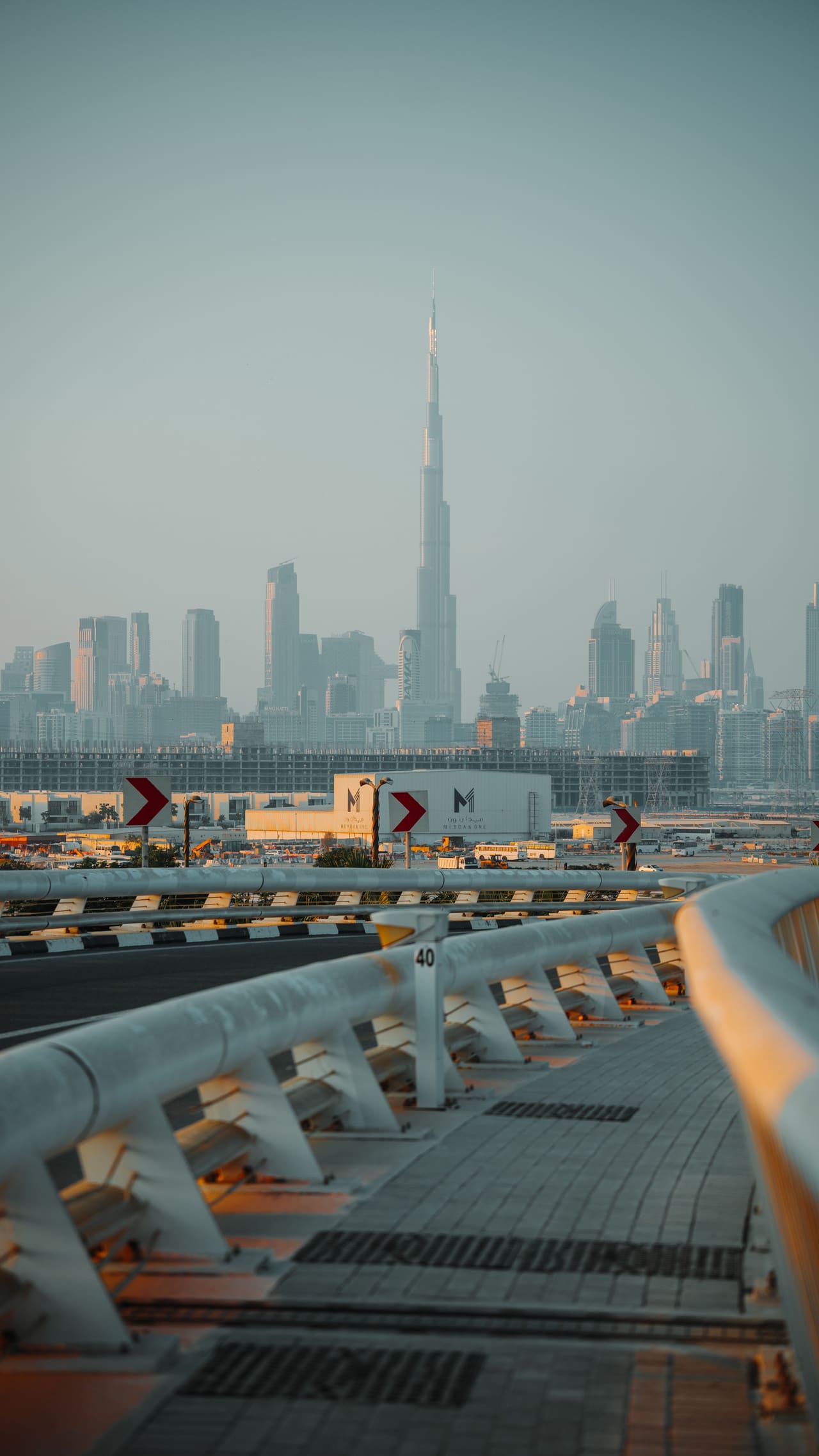 The Burj Khalifa and Downtown Dubai seen from the interchange in daylight